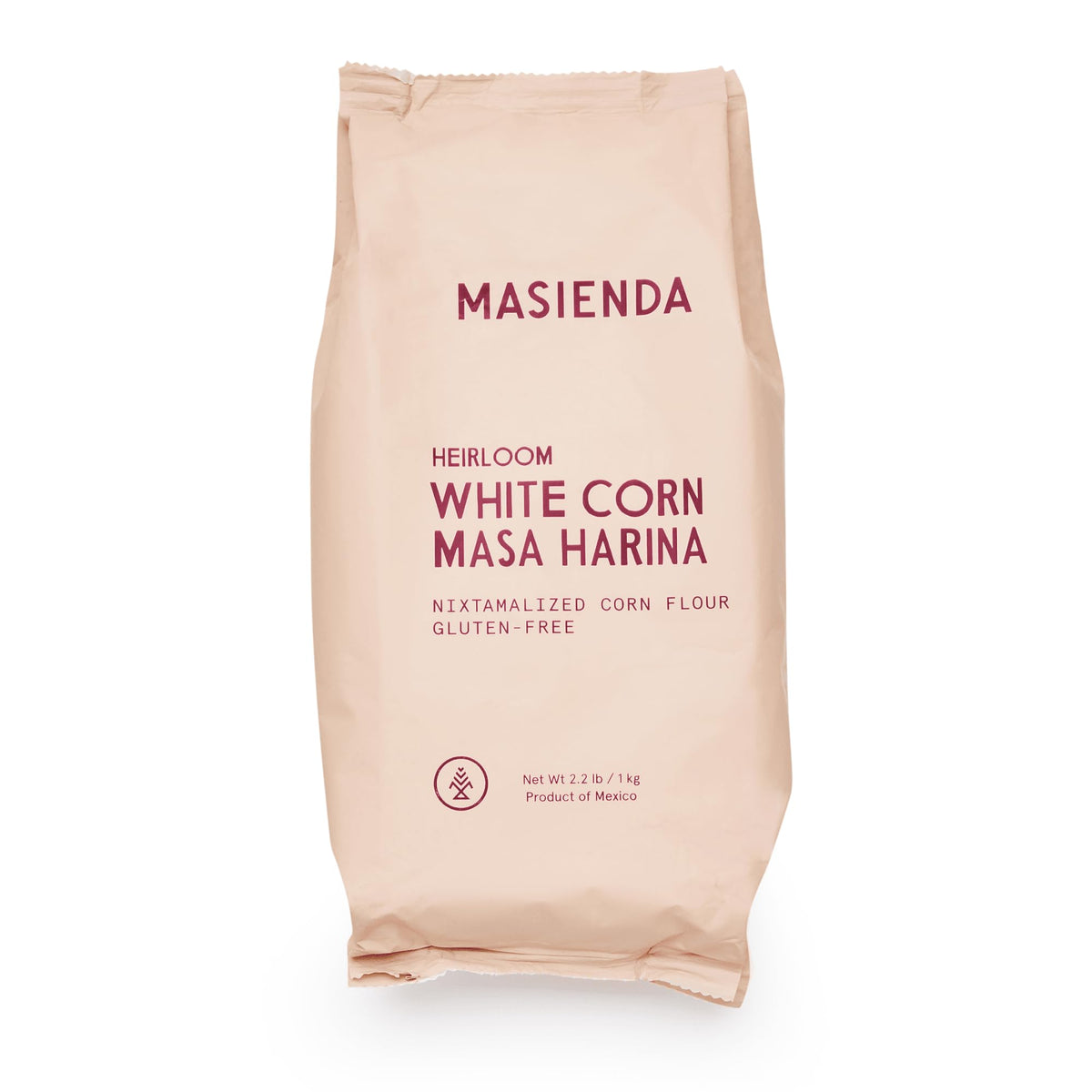 Masienda Heirloom White Corn Masa Harina bag shown on a wooden surface for authentic tortillas and tamales.