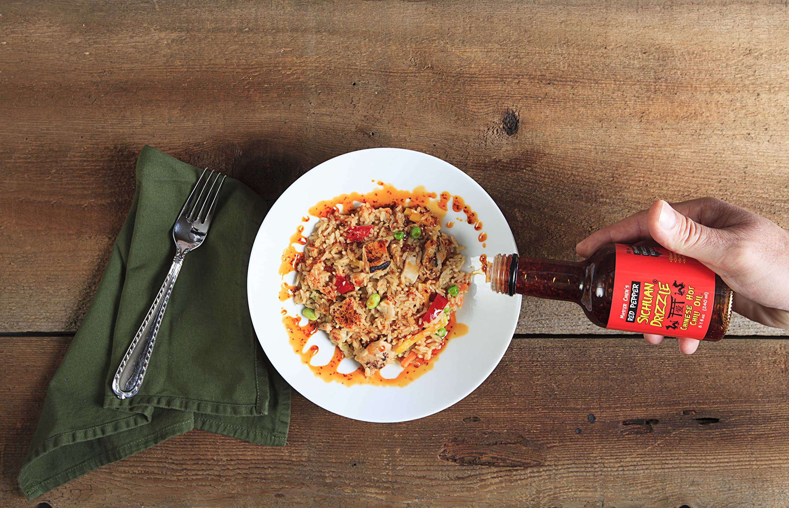 Steaming noodles topped with Master Chen's Drizzle for a quick, flavorful finish.