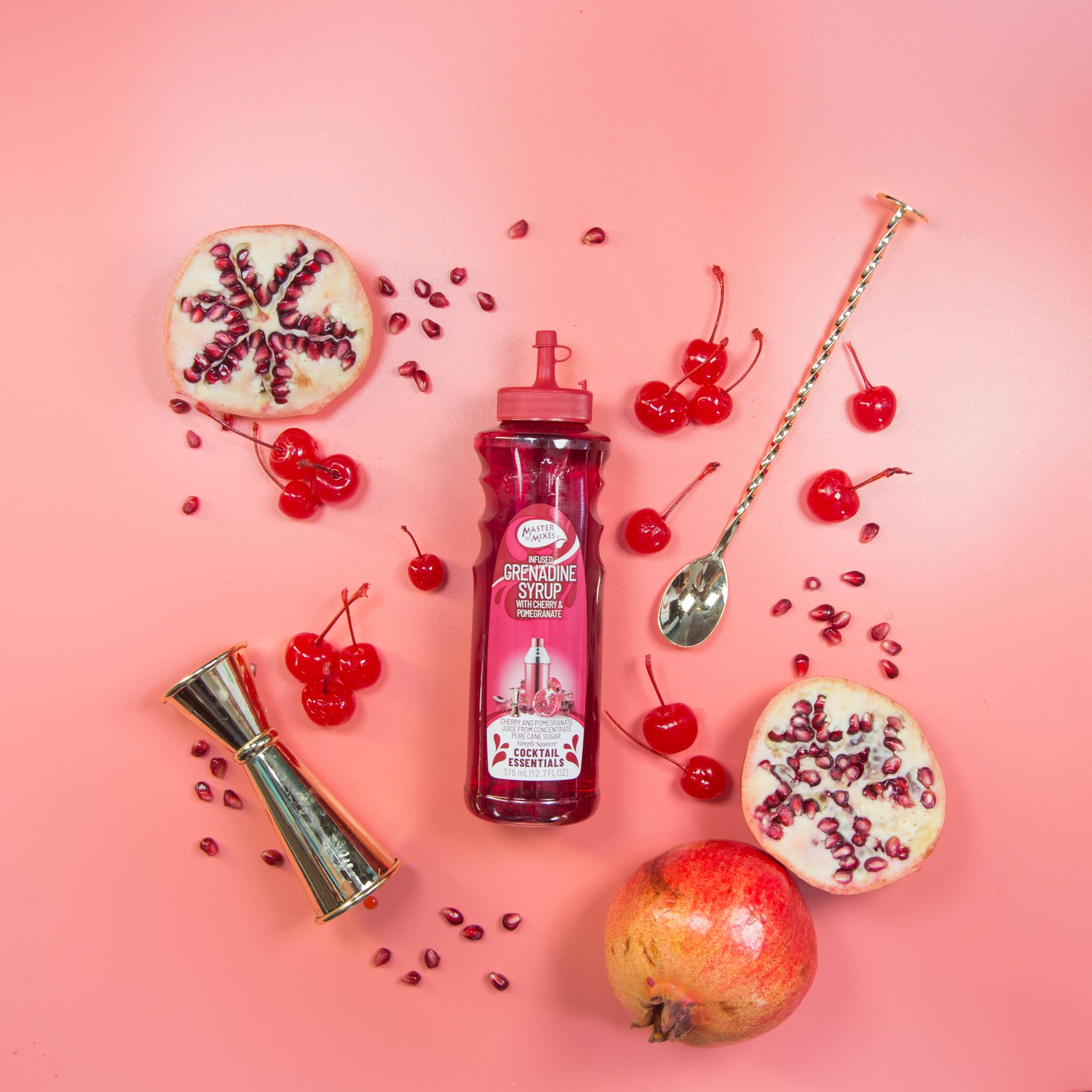 Master of Mixes Grenadine pour, ideal for finishing Manhattans and Roy Rogers.