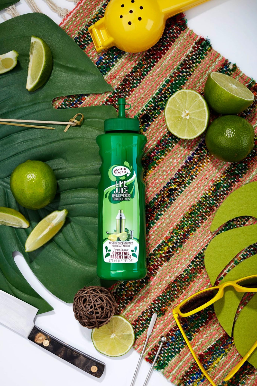 Fresh lime slices accompany Master of Mixes lime juice
