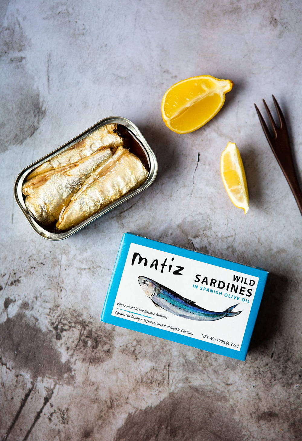 Matiz sardines in olive oil close-up of fillets and skin