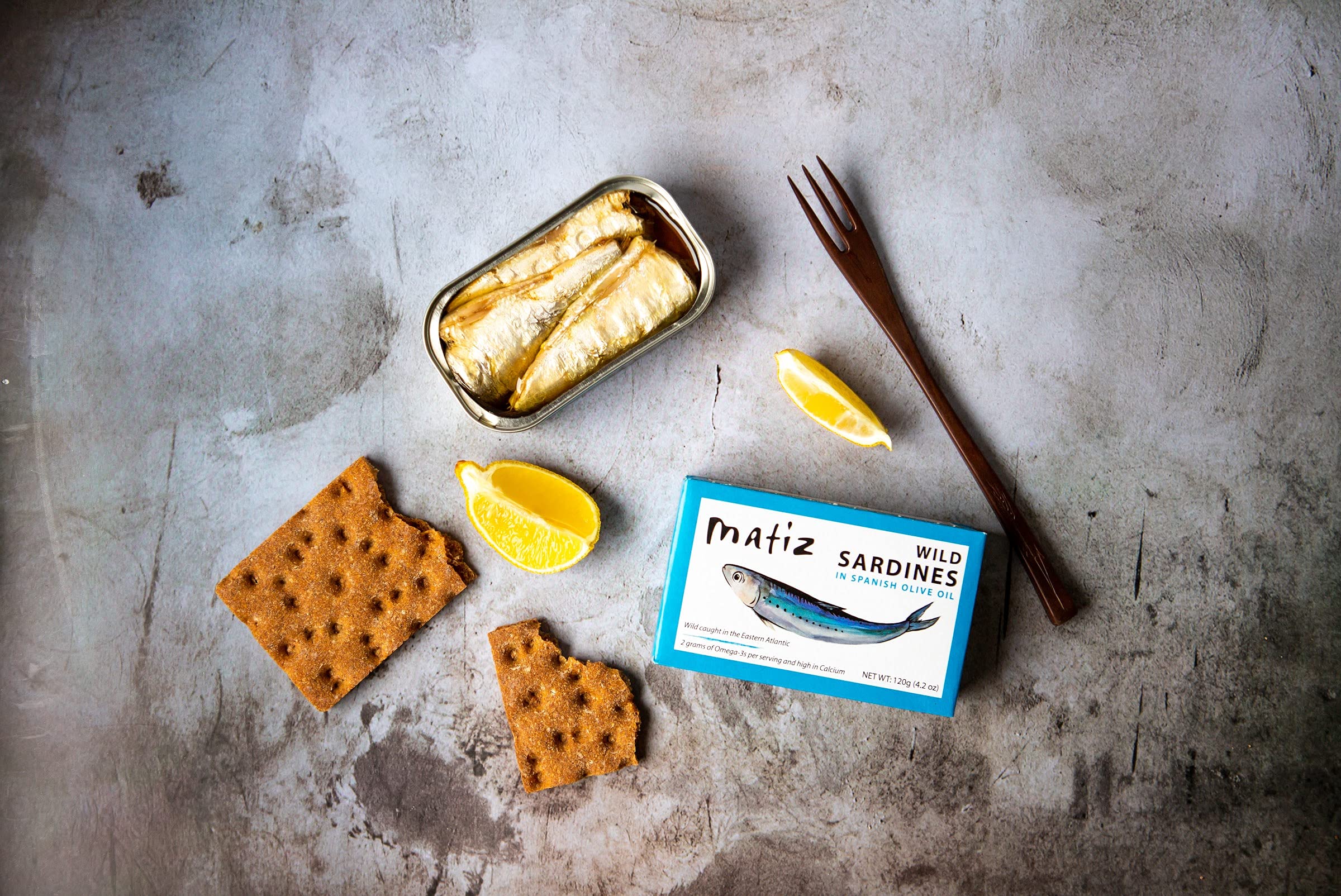Matiz sardines in olive oil on store shelf packaging