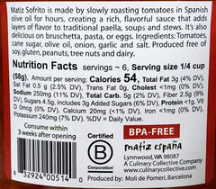 Matiz Sofrito simmer close-up of tomatoes and olive oil for rich flavor.