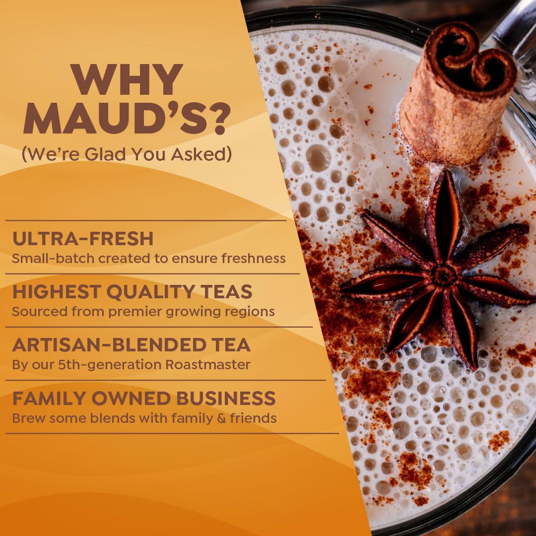 Steaming cup of MAUD'S chai tea latte evokes warm comfort.