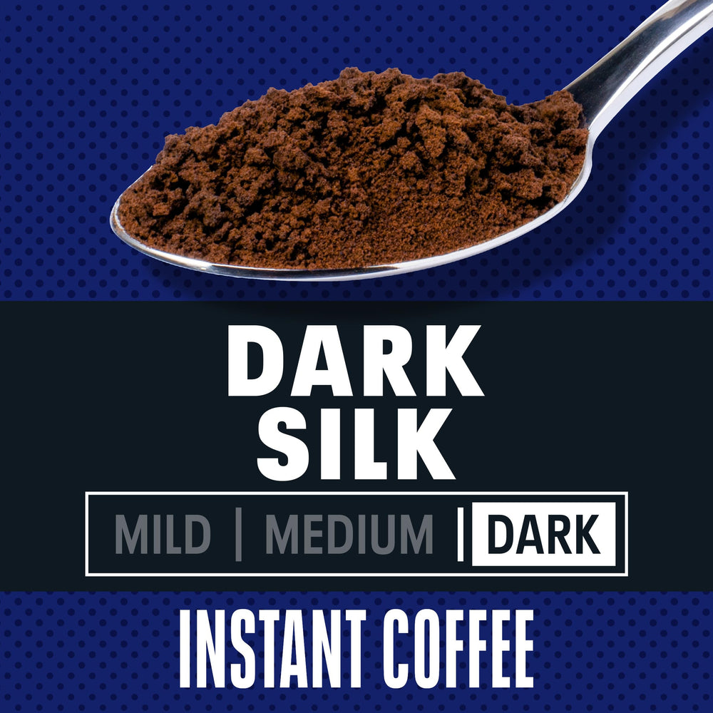 Maxwell House Dark Silk Instant Coffee dissolving in water to create a bold cup