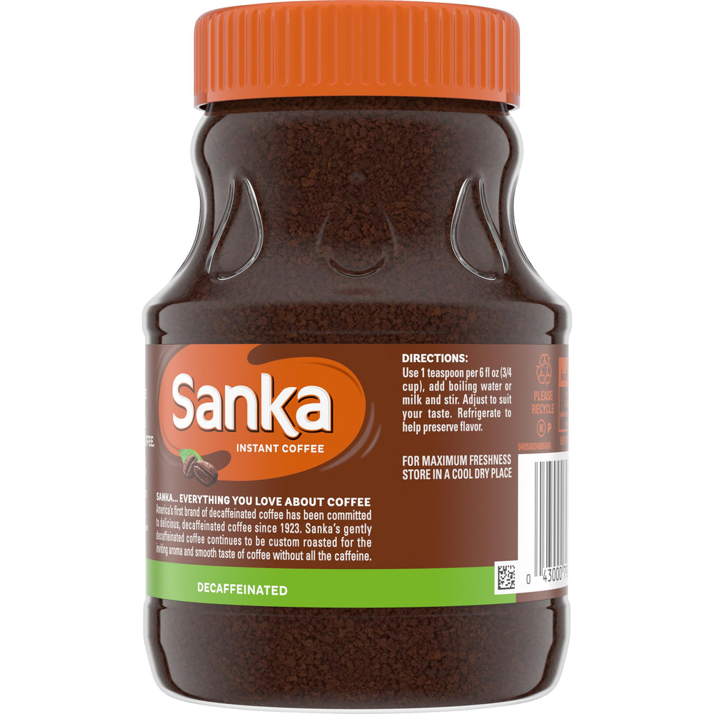 Steaming cup of Maxwell House Sanka decaf instant coffee for a quick brew.