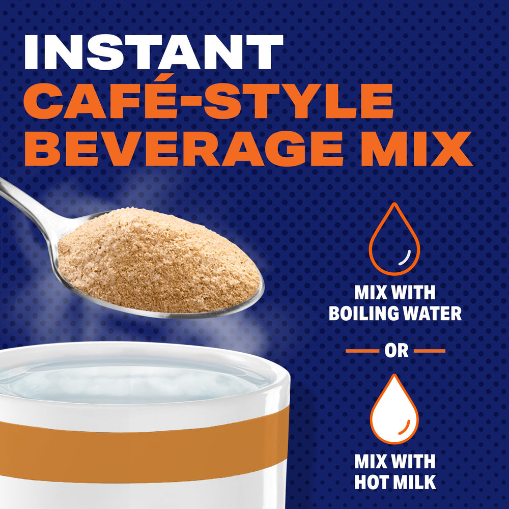 Whisking Maxwell House Vanilla Caramel Latte until a silky foam forms on the surface