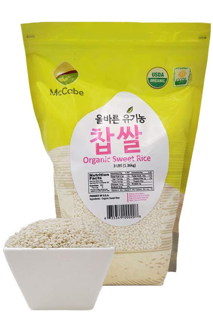 Close-up of McCabe Organic Sweet Rice raw grains, glossy and fragrant.
