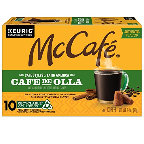 Boxed McCafé Café de Olla pods next to a mug.