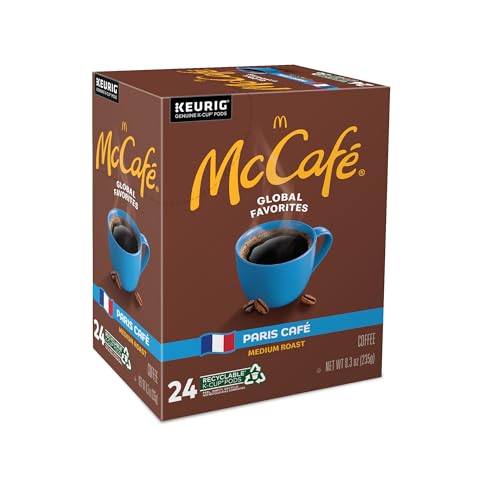 McCafé Paris Café cup with crema on a cozy table.