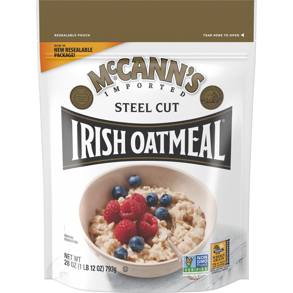 McCann's Irish Oatmeal steel-cut oats canister in a cozy kitchen, ideal for breakfast.