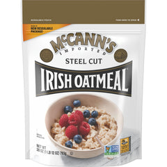 McCann's Irish Oatmeal steel-cut oats canister in a cozy kitchen, ideal for breakfast.