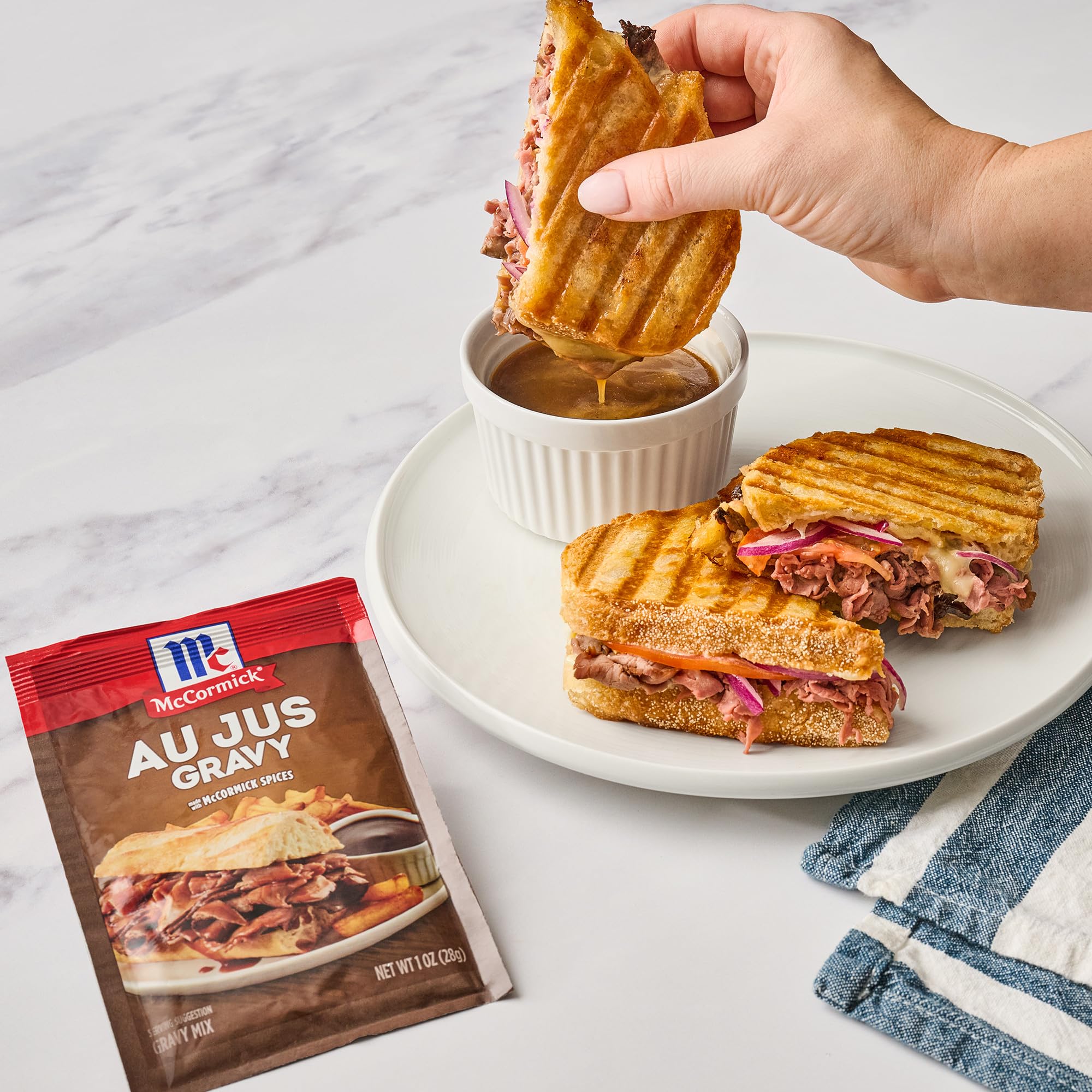 McCormick Au Jus Gravy Mix label highlights no artificial flavors or colors.