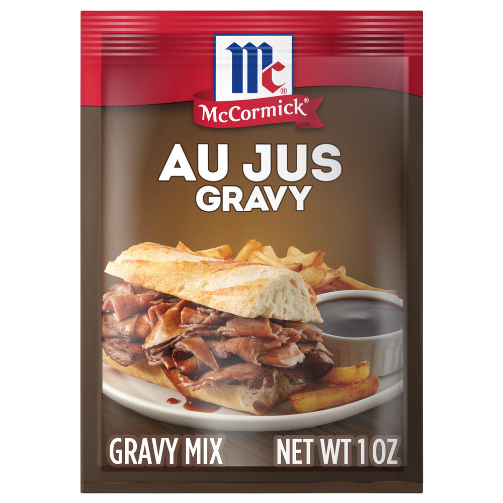 McCormick Au Jus Gravy Mix packet ready to whisk into water for rich flavor.