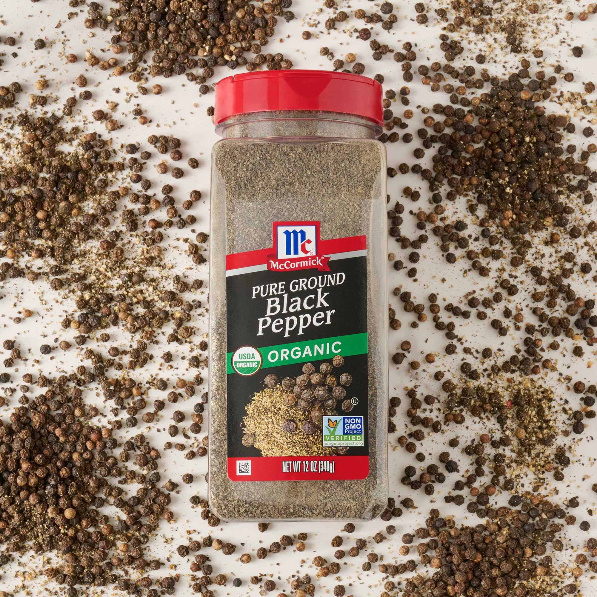 Easy-to-refill McCormick Black Pepper Organic Ground bottle on the counter.
