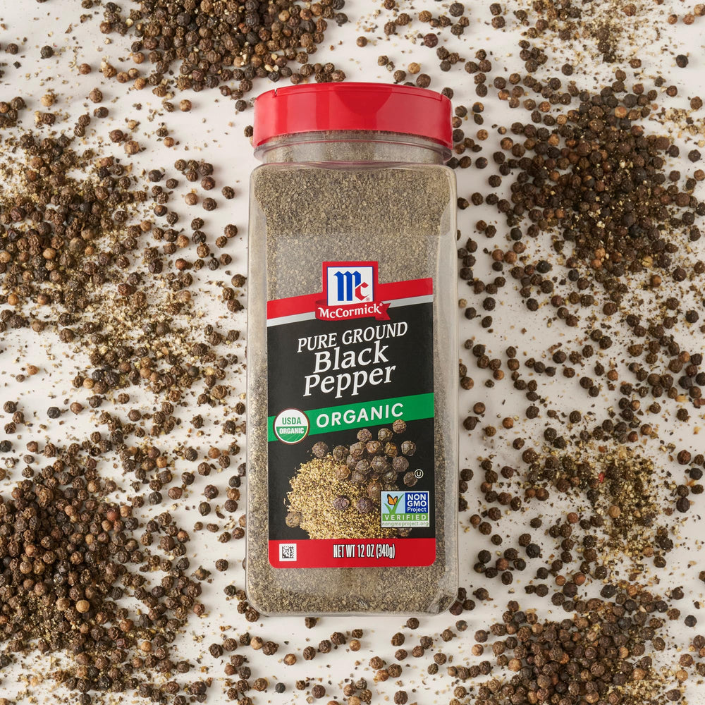 Easy-to-refill McCormick Black Pepper Organic Ground bottle on the counter.