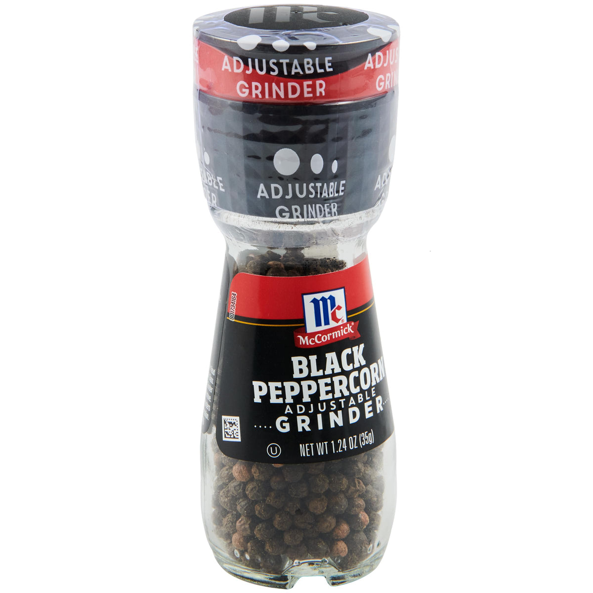 McCormick Black Peppercorn Grinder bottle on a tidy tabletop for quick seasoning.