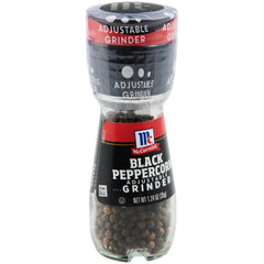 McCormick Black Peppercorn Grinder bottle on a tidy tabletop for quick seasoning.