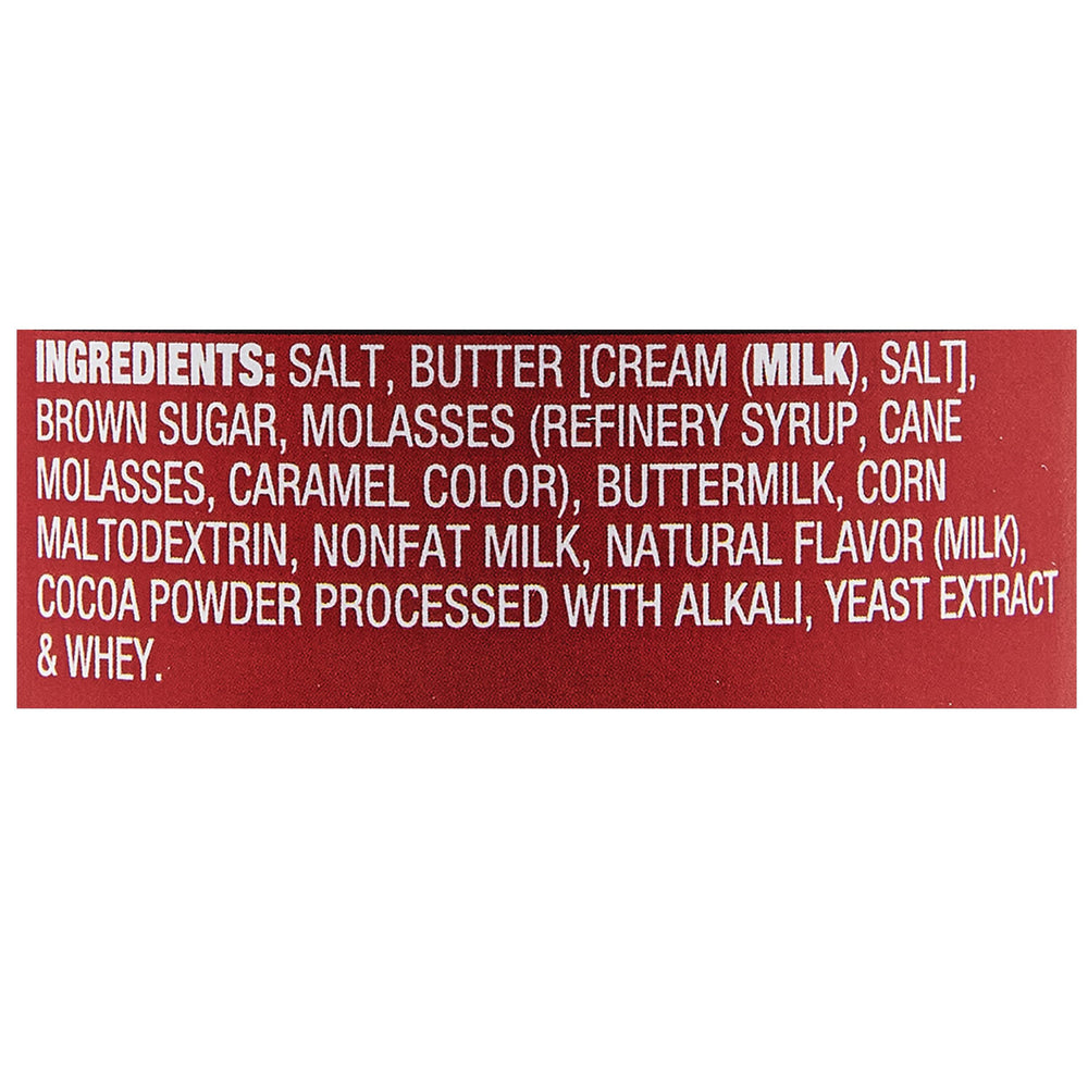 Pouring McCormick Brown Butter Seasoning onto pasta for a nutty boost