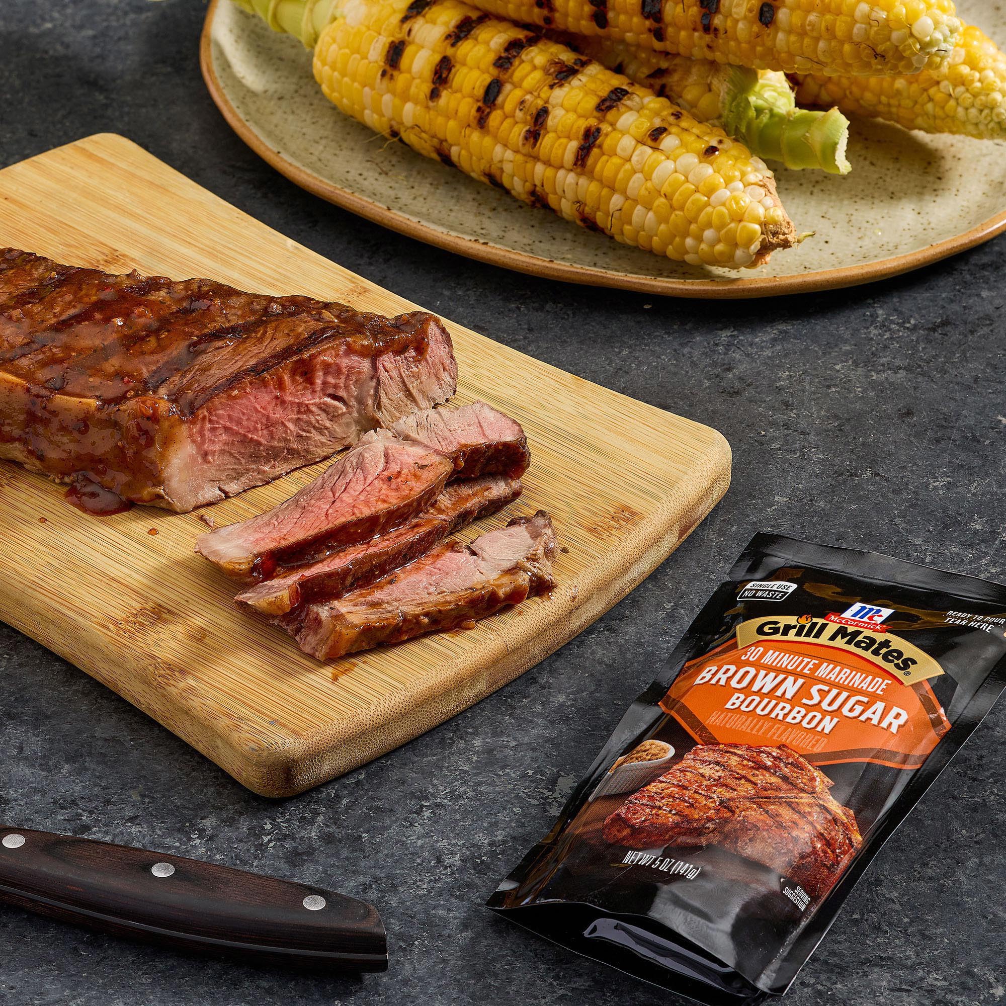 Grilled meats on the grill after marinating with McCormick Brown Sugar Bourbon