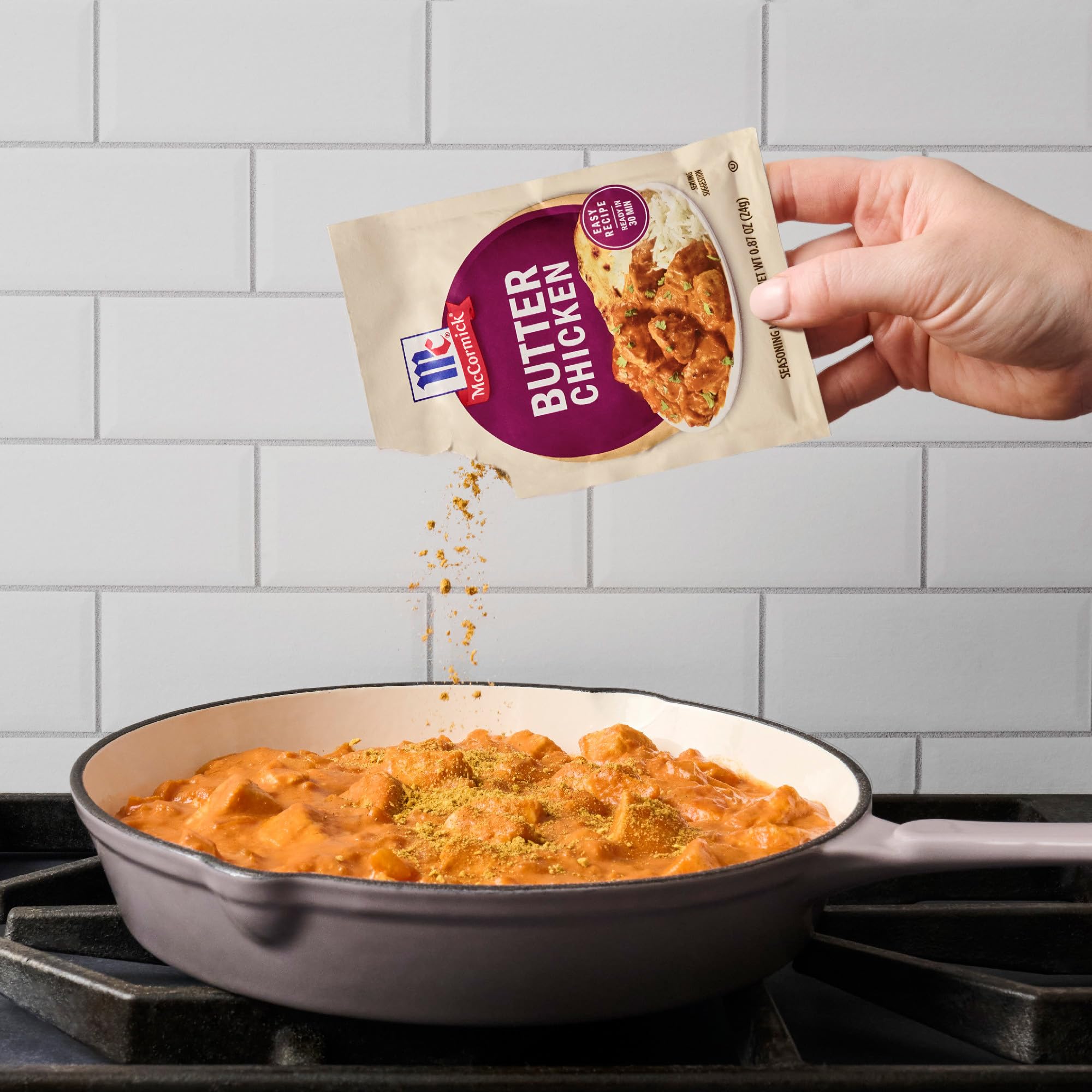 McCormick Butter Chicken Seasoning spice closeup reveals vibrant masala texture.