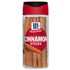 McCormick Cinnamon Sticks bottle on kitchen shelf for warm flavor during cooking.