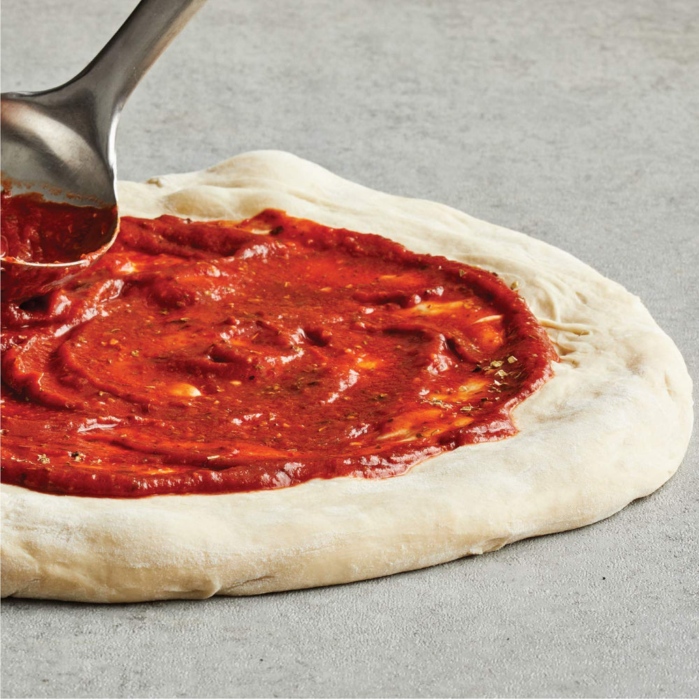 McCormick Crushed Red Pepper on pizza provides vibrant color and spice