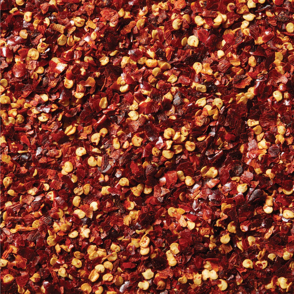McCormick Crushed Red Pepper sprinkled on tacos for warmth