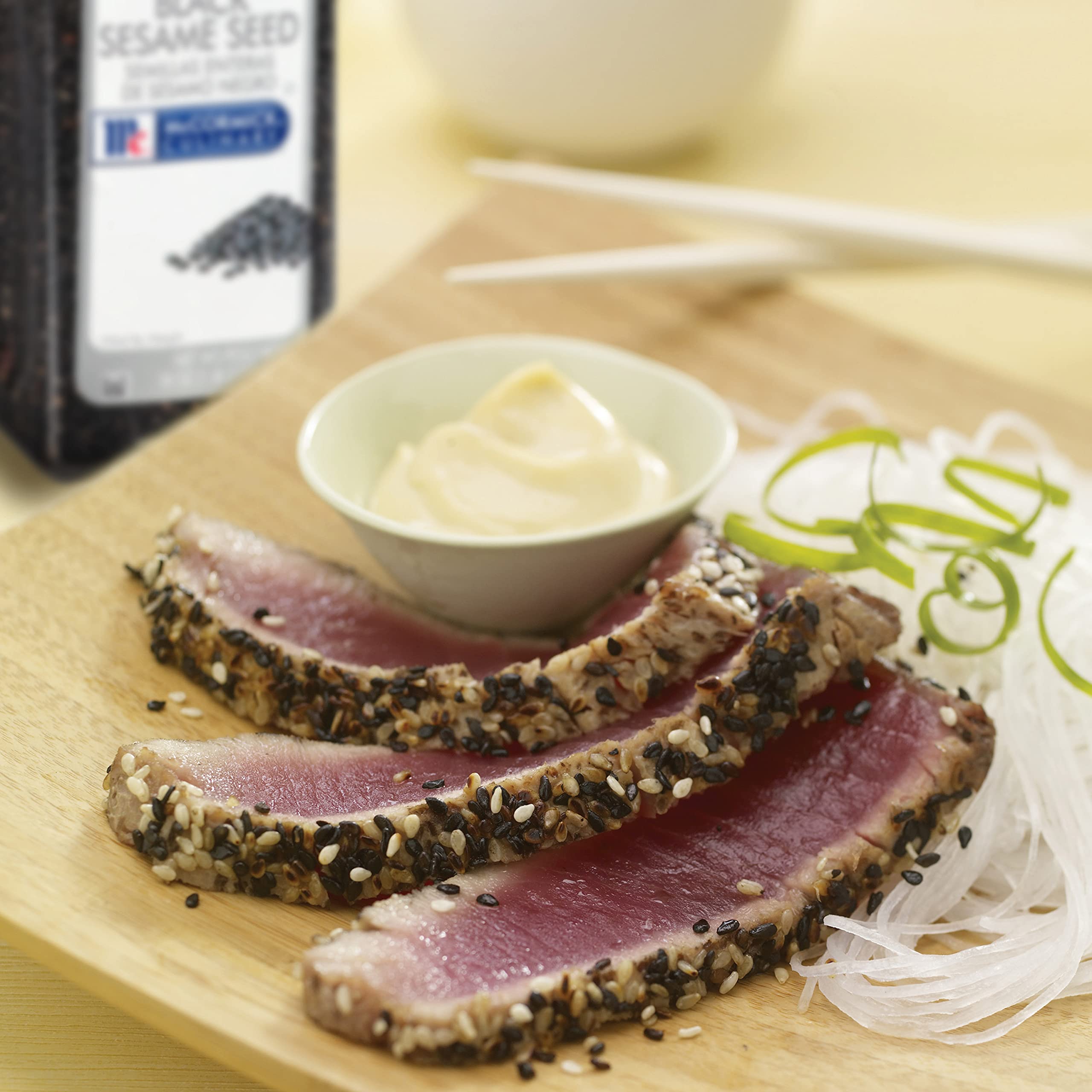 Bakery garnish using McCormick Culinary black sesame seeds to enhance crust color.