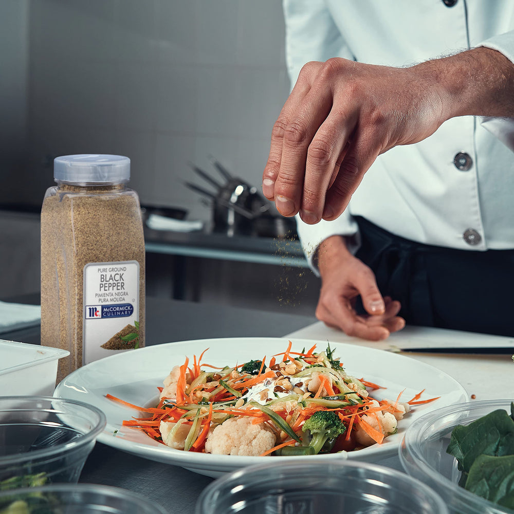 McCormick Culinary pepper sprinkled on grilled asparagus for a bright aroma.