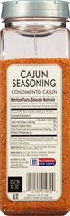 Pouring McCormick Culinary Cajun Seasoning to add bold flavor quickly.