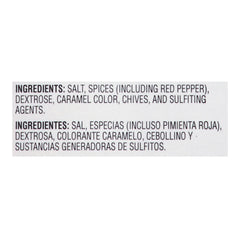 Pouring jerk seasoning for marinades releases vibrant aroma and heat.