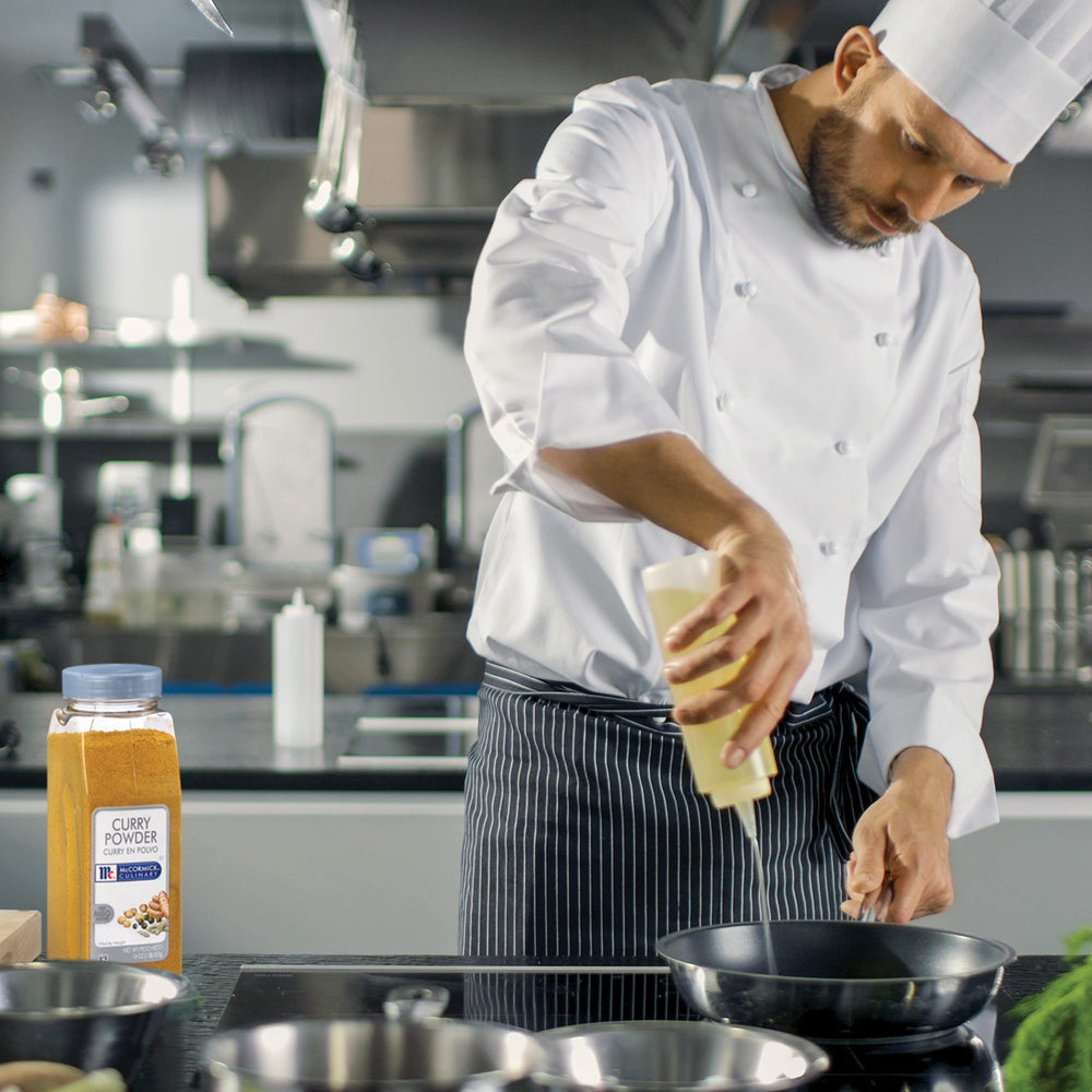 Curried dish prepared with McCormick Culinary Curry Powder, showcasing warm, aromatic flavors.