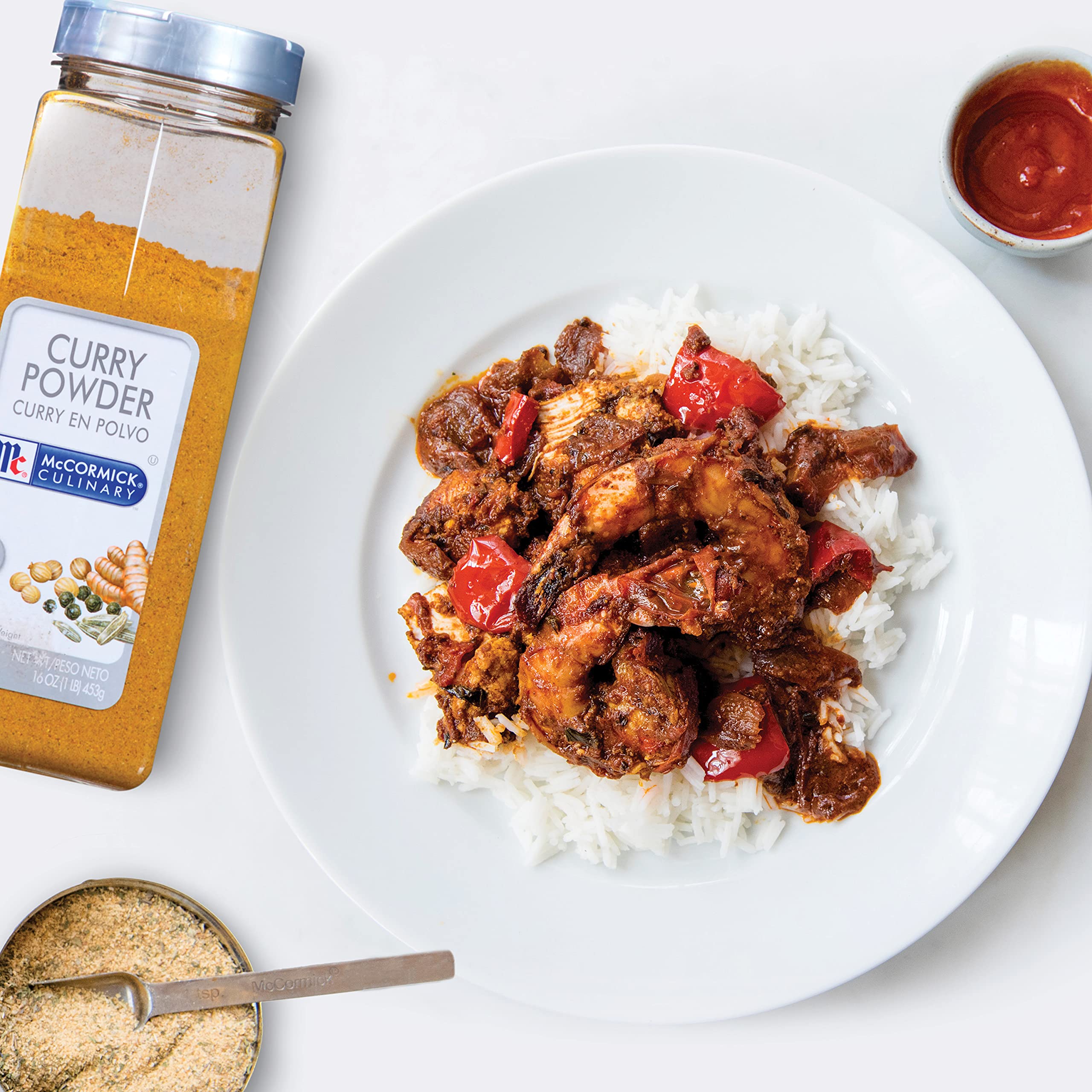 Simmer pot scene using McCormick Culinary Curry Powder to create depth in curry sauce.
