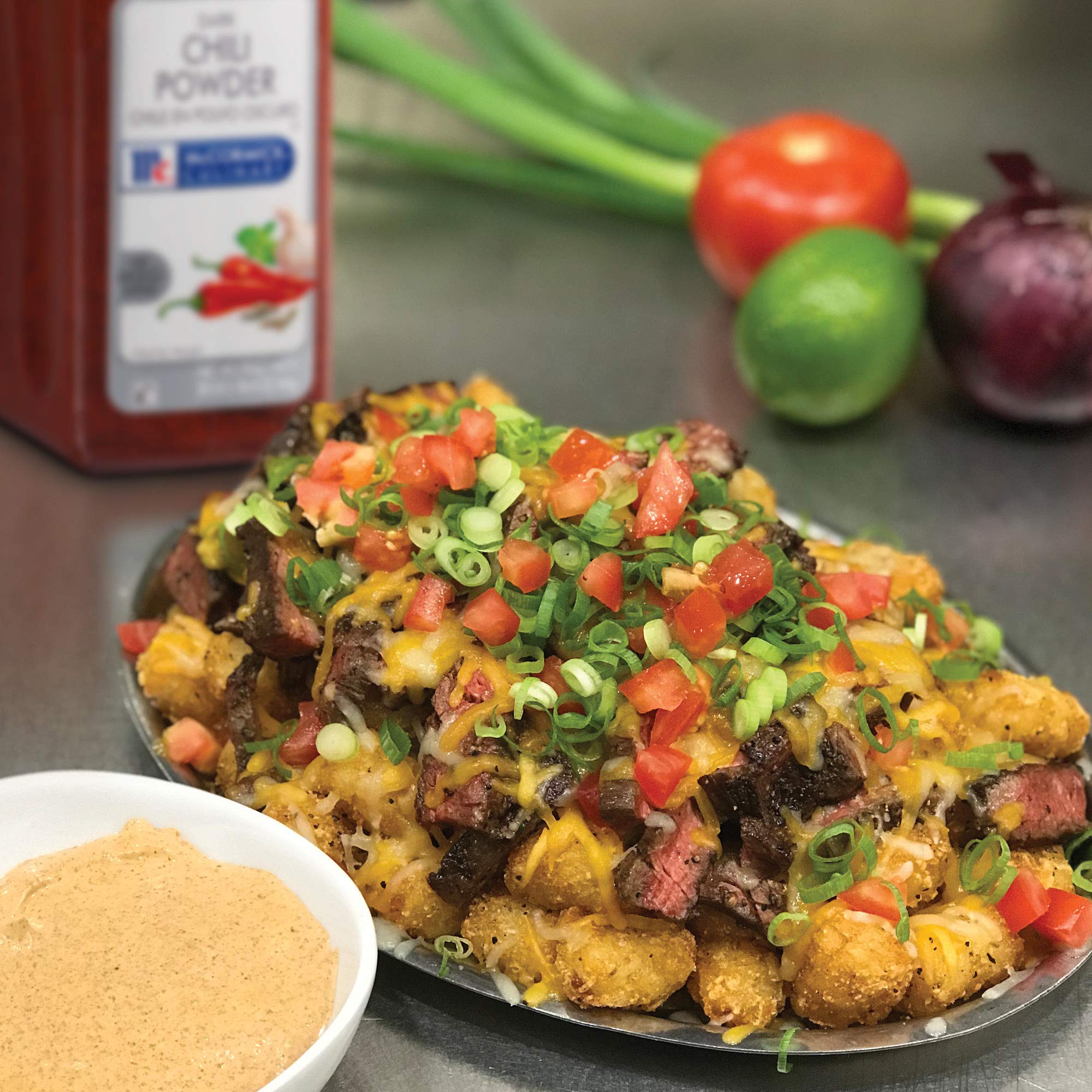 McCormick Culinary Dark Chili Powder adds color to enchiladas