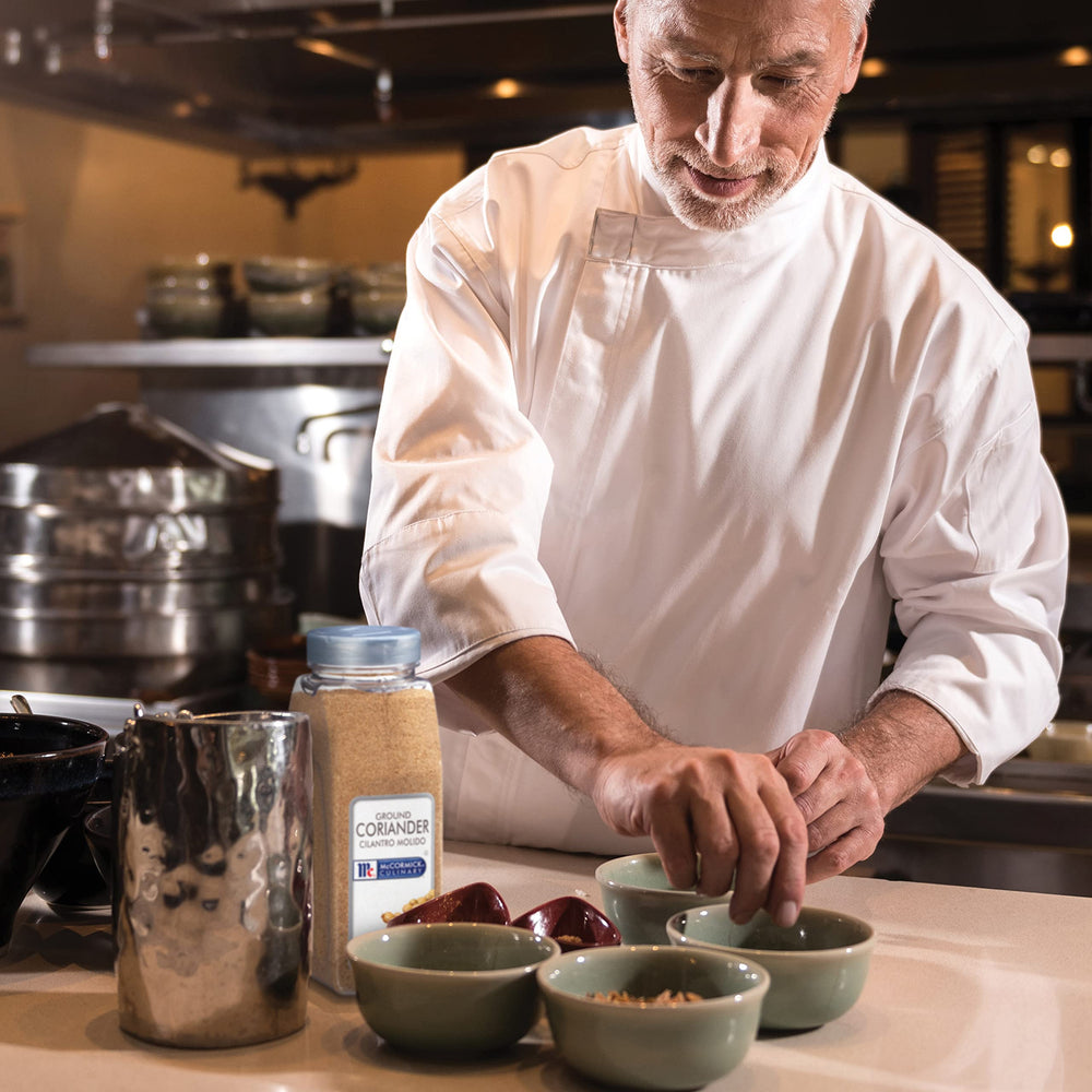 Pan-seared dish simmering with coriander aroma for global flavor