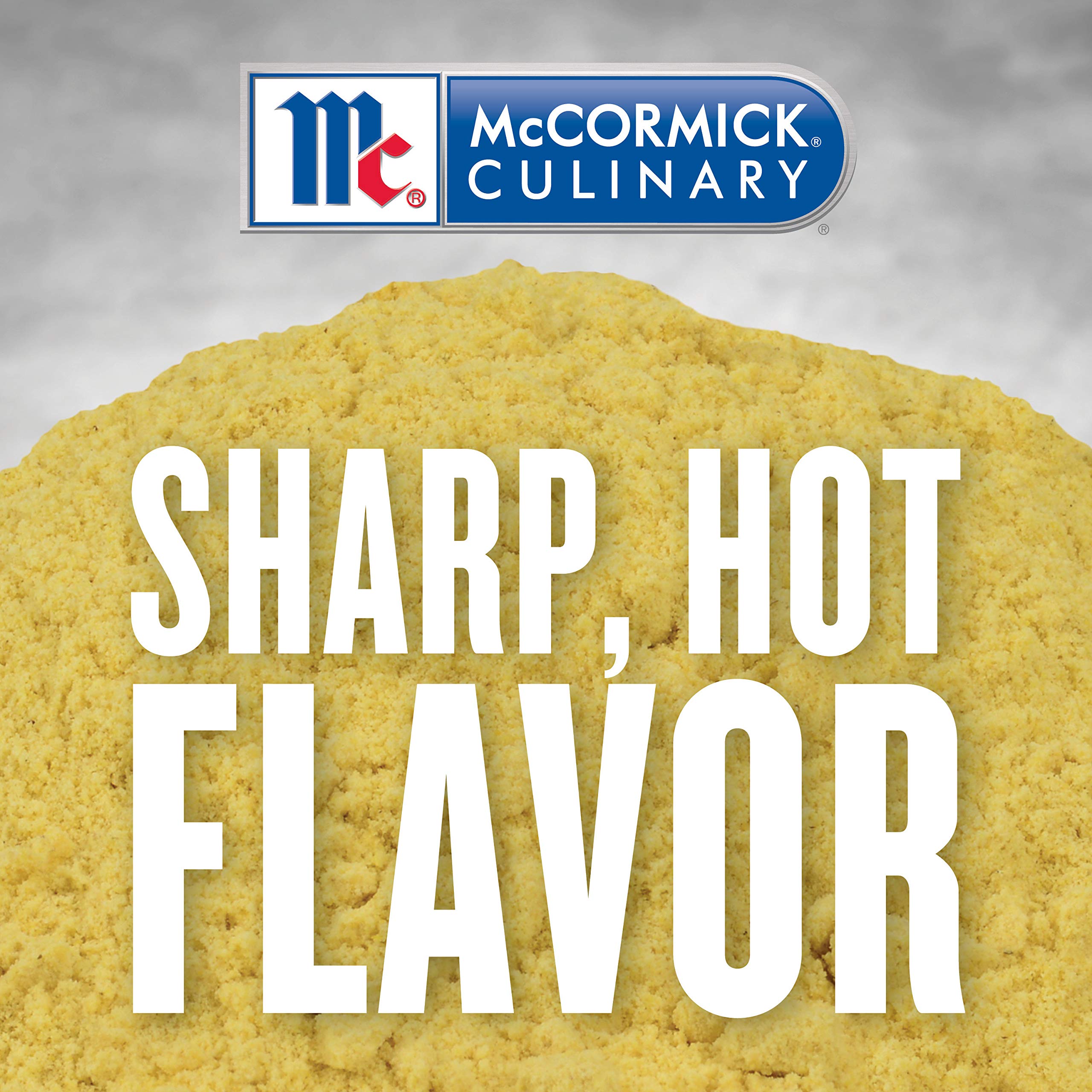 McCormick Culinary mustard powder in measuring cup for batch prep.