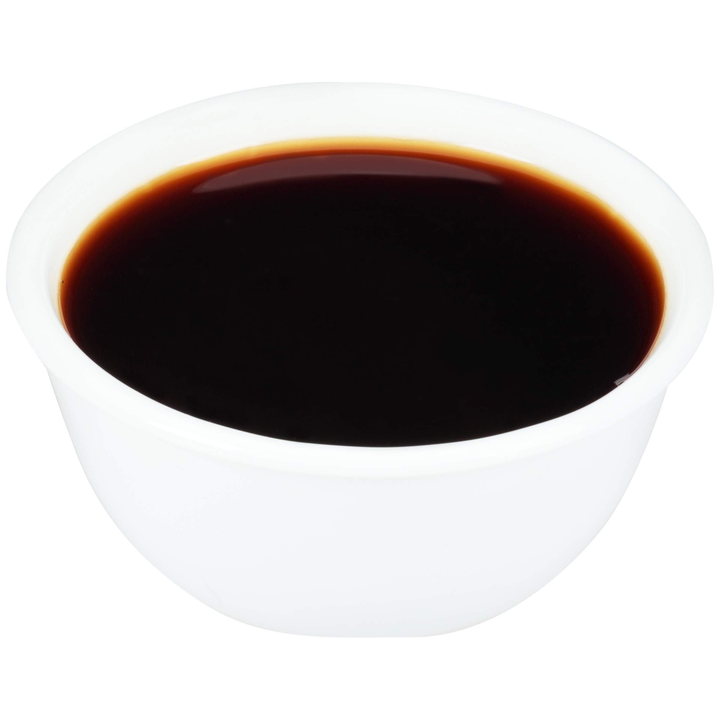 McCormick Culinary Imitation Vanilla flavor pour into mixing bowl