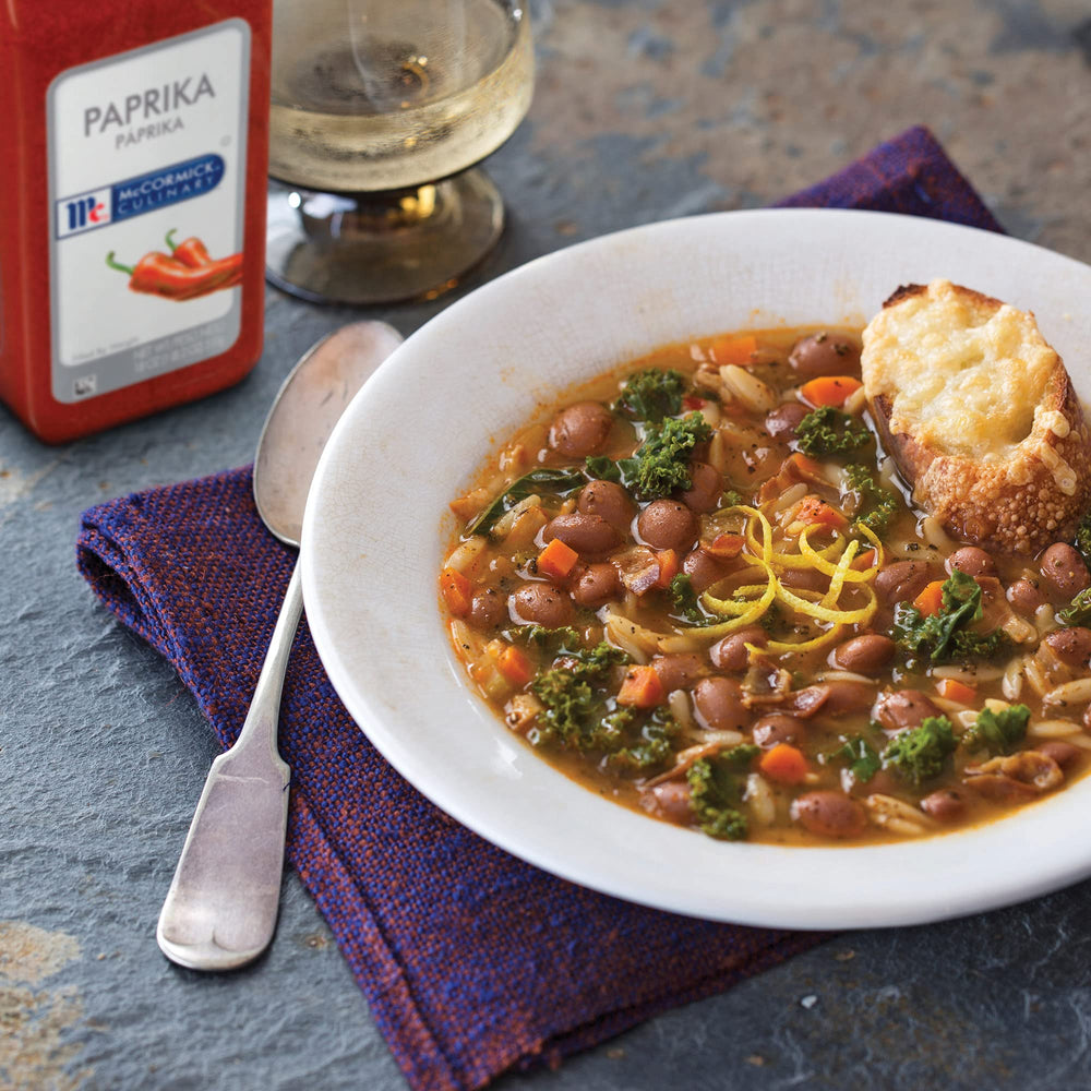 McCormick Culinary Paprika beef dish plated with warm paprika color