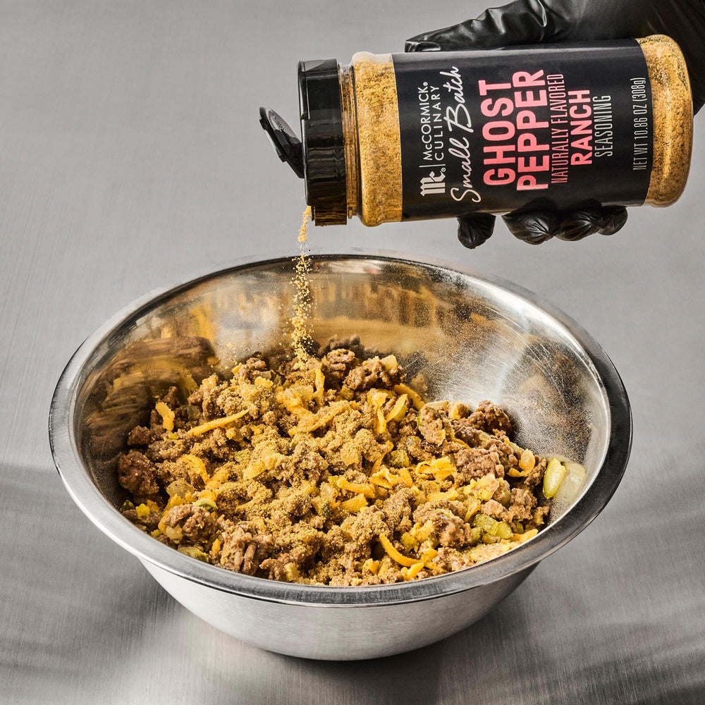 McCormick Culinary seasoning dust on a dish for texture and spice.