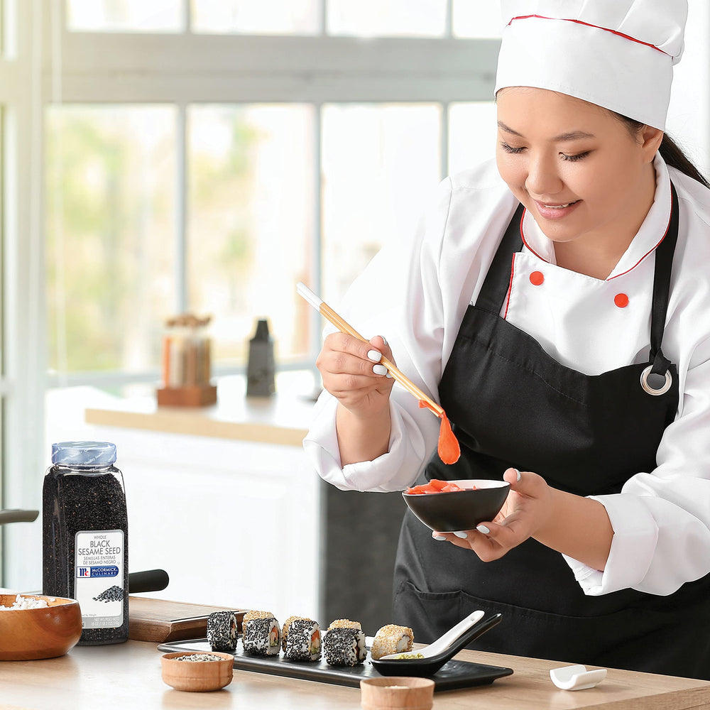 Sushi topping with McCormick Culinary black sesame seeds for visual appeal.