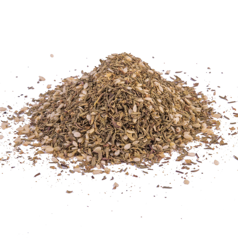 Seasoning bowl with McCormick Za'atar blends herbs and lemon zest.