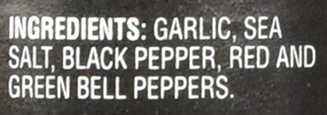 Close-up of the grinder dispensing fresh garlic pepper for meals