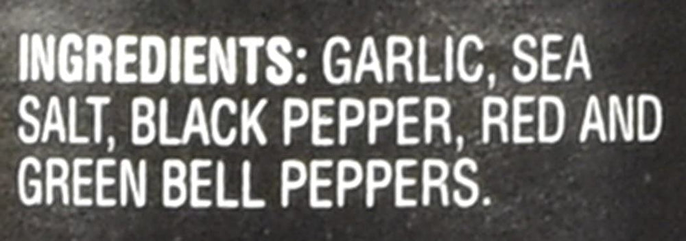 Close-up of the grinder dispensing fresh garlic pepper for meals
