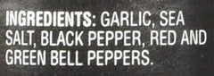 Close-up of the grinder dispensing fresh garlic pepper for meals
