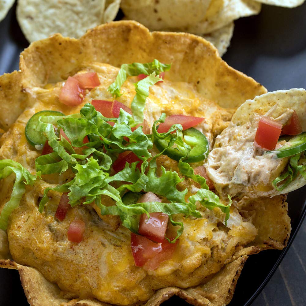 Cooked taco meat in bowls ready for toppings with McCormick