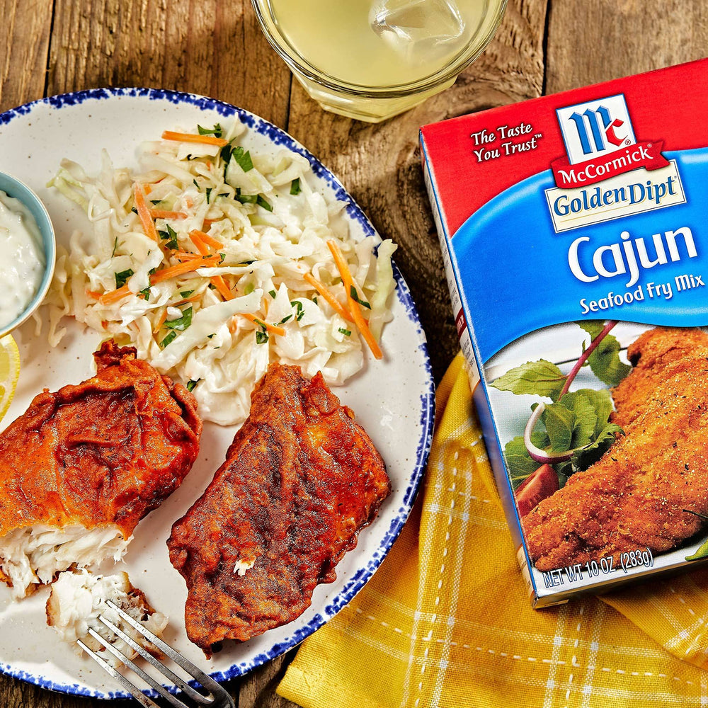 Finished seafood platter with spicy, crispy crust from McCormick mix.