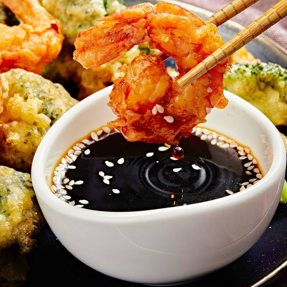 McCormick Golden Dipt Tempura Batter Mix frying oil demonstrates golden-brown finish.