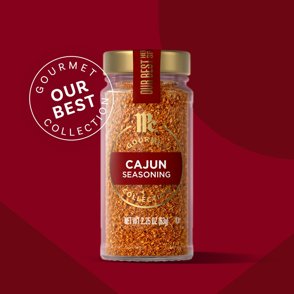 Measuring spoon scooping McCormick Gourmet Cajun Seasoning