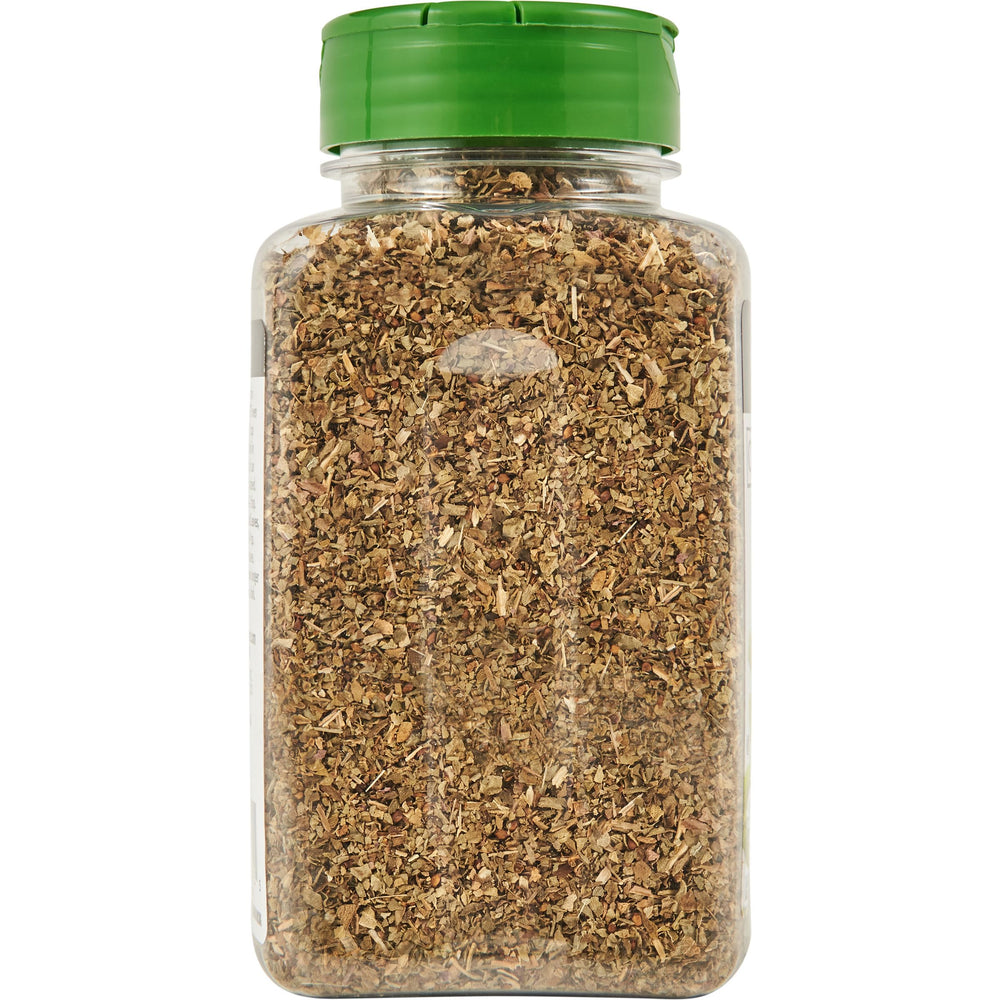 McCormick Gourmet Organic Basil Leaves on kitchen counter offering fresh flavor at hand.